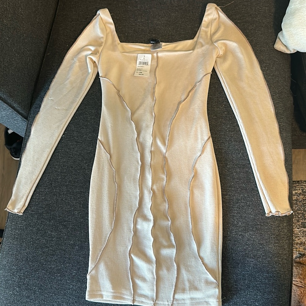 White mini long sleeve dress with caramel color detail. New with tags